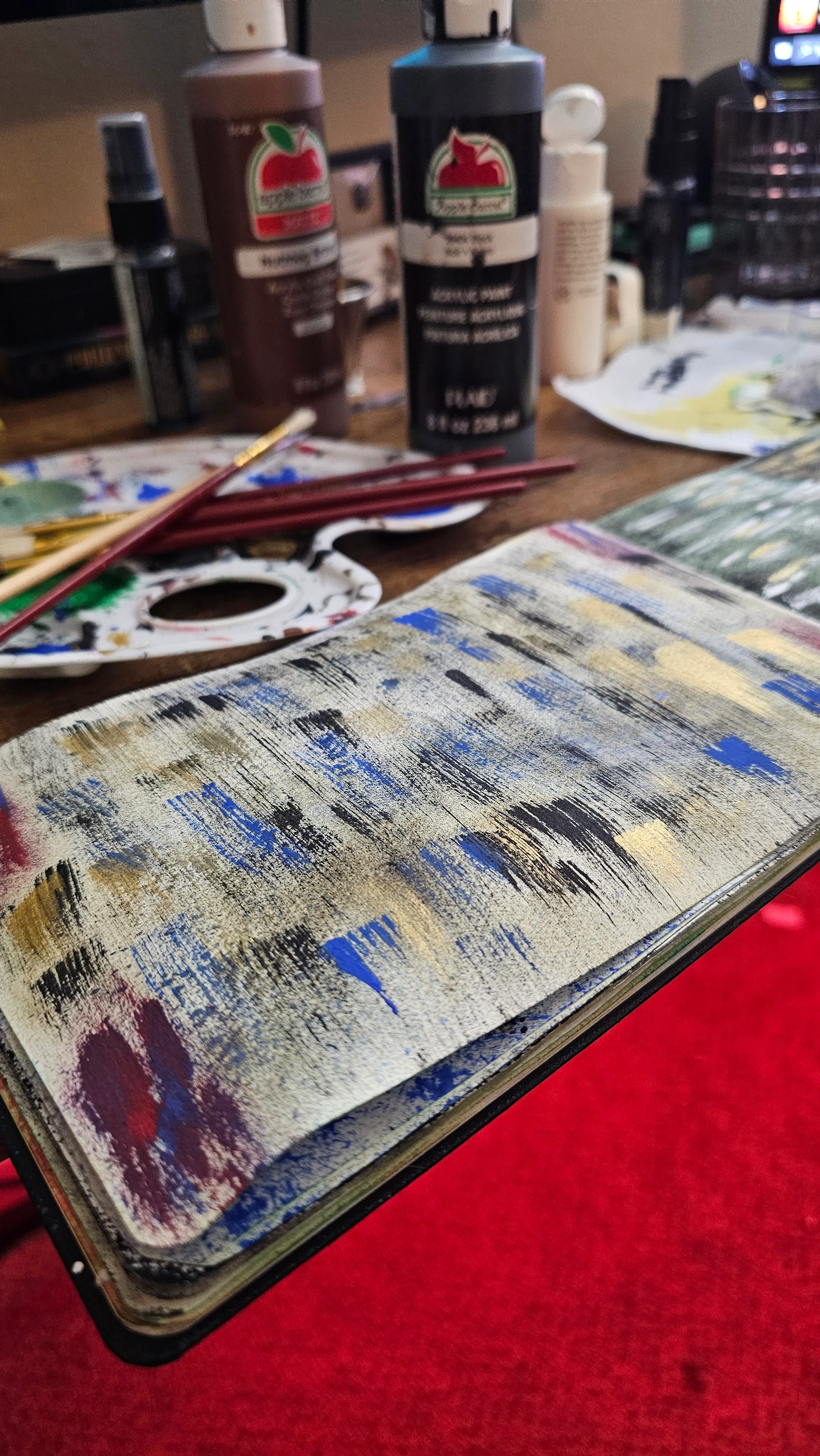 A photograph taken by photographer Adam Scott, in Powder Springs, GA, of his art journal.